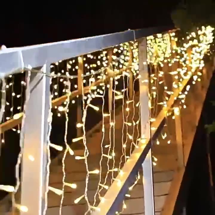 Quntis Warmwhite Solar-Powered 19.7ft x 1.6ft LED Icicle Lights ¨C Waterproof Waterfall Fairy Lights for Christmas & Outdoor Holiday Decor