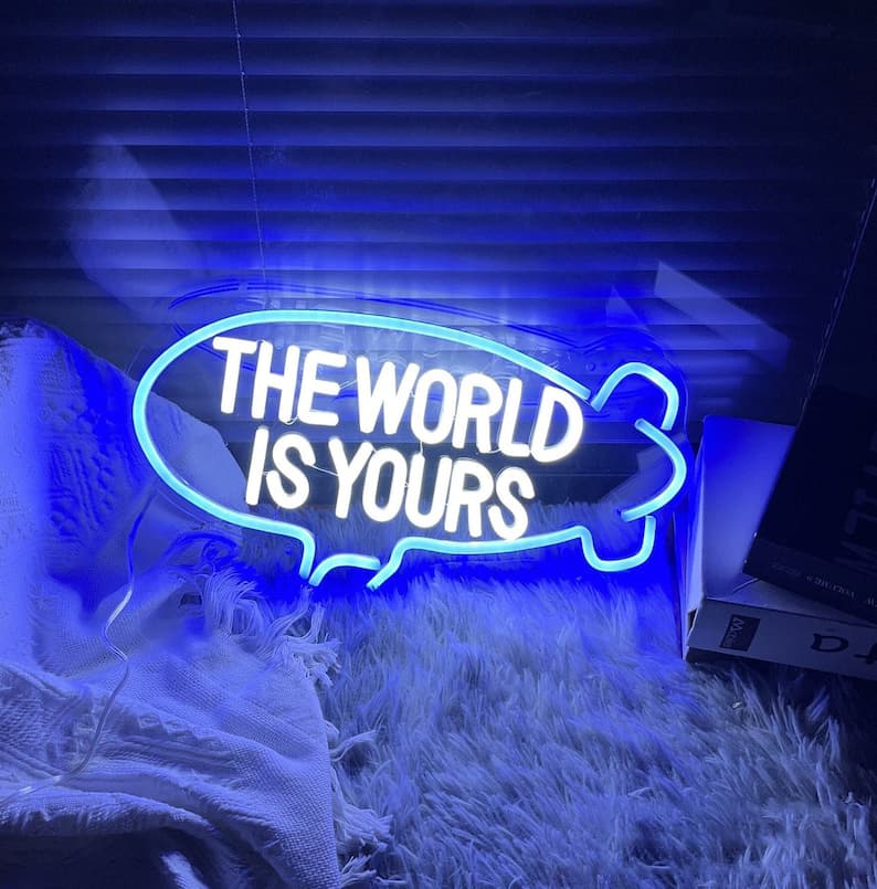 The World Is Yours" Neon Sign in Brilliant Blue – Inspirational Light for Motivational Home Offices, Study Areas, and Modern Decor