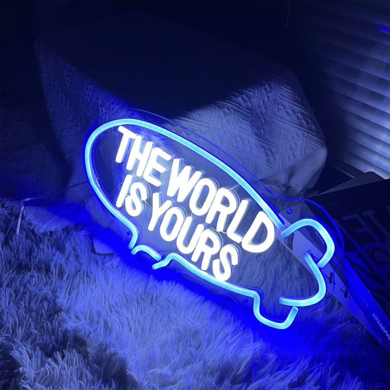 The World Is Yours" Neon Sign in Brilliant Blue – Inspirational Light for Motivational Home Offices, Study Areas, and Modern Decor