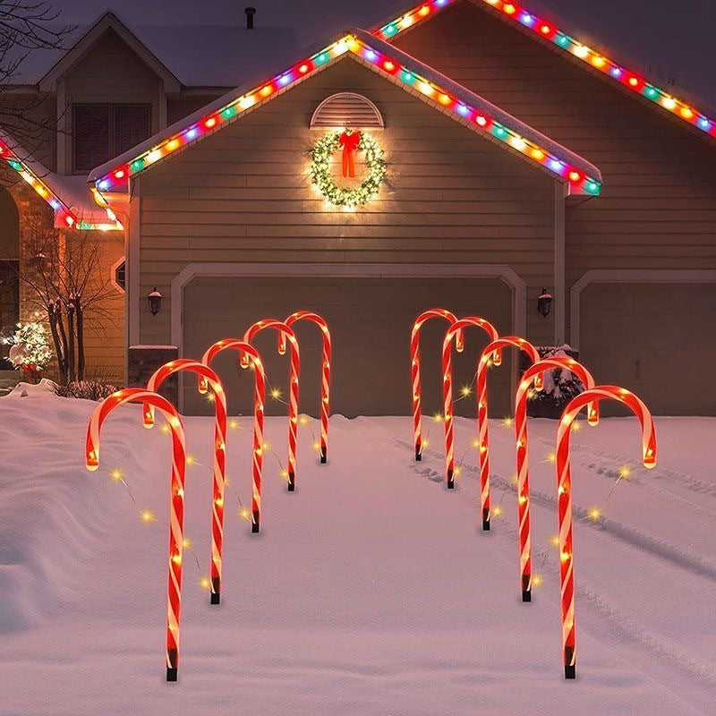 Lumières de Noël solaires d'extérieur – Lumières de sol en forme de canne en sucre pour décoration de pelouse de vacances, ensemble de 1 à 5 pour un pays des merveilles hivernal festif. Lumières en forme de canne en sucre.